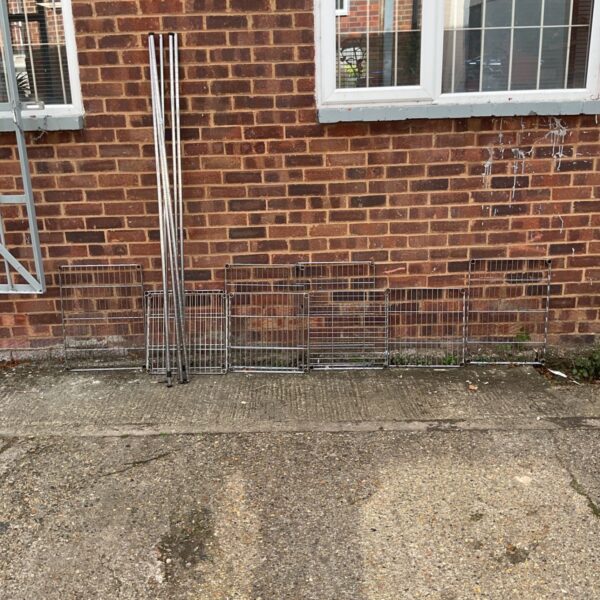 Chrome wire shelving unit for kitchen or garage storage.
