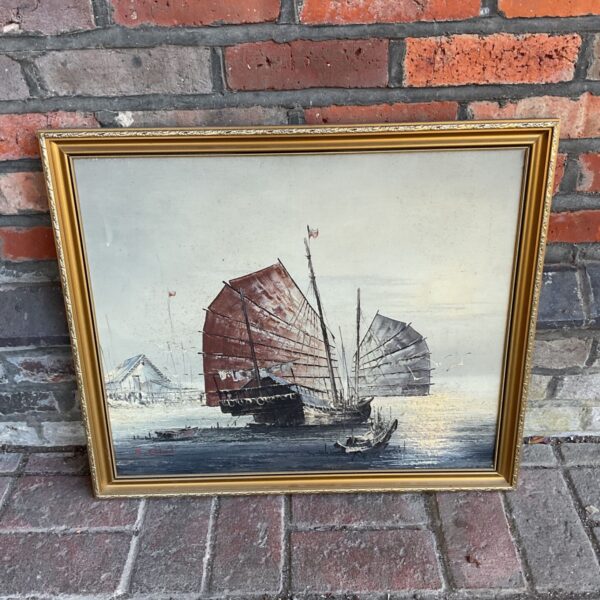 Signed C citan oil painting of a Chinese junk ship at sea.