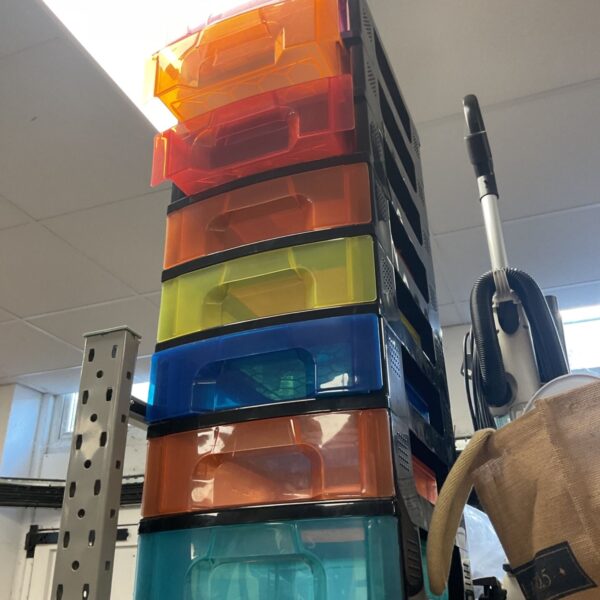 Colourful tower storage unit with translucent drawers in pink, orange, blue and turquoise