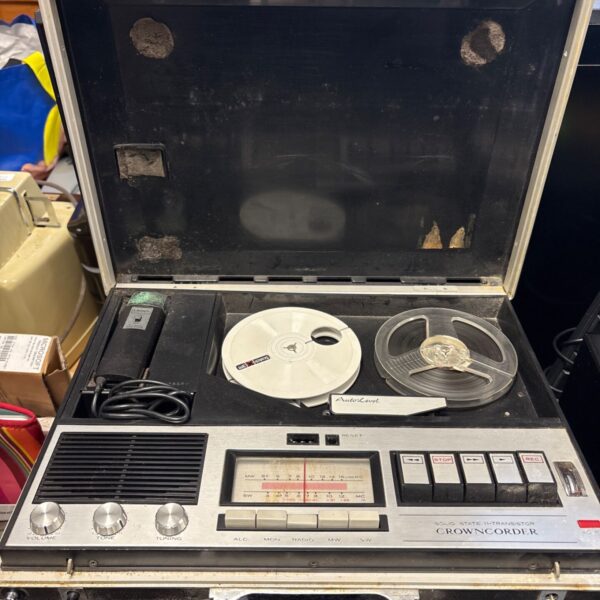 Crowncorder solid state 11-transistor portable tape recorder open in carry case
