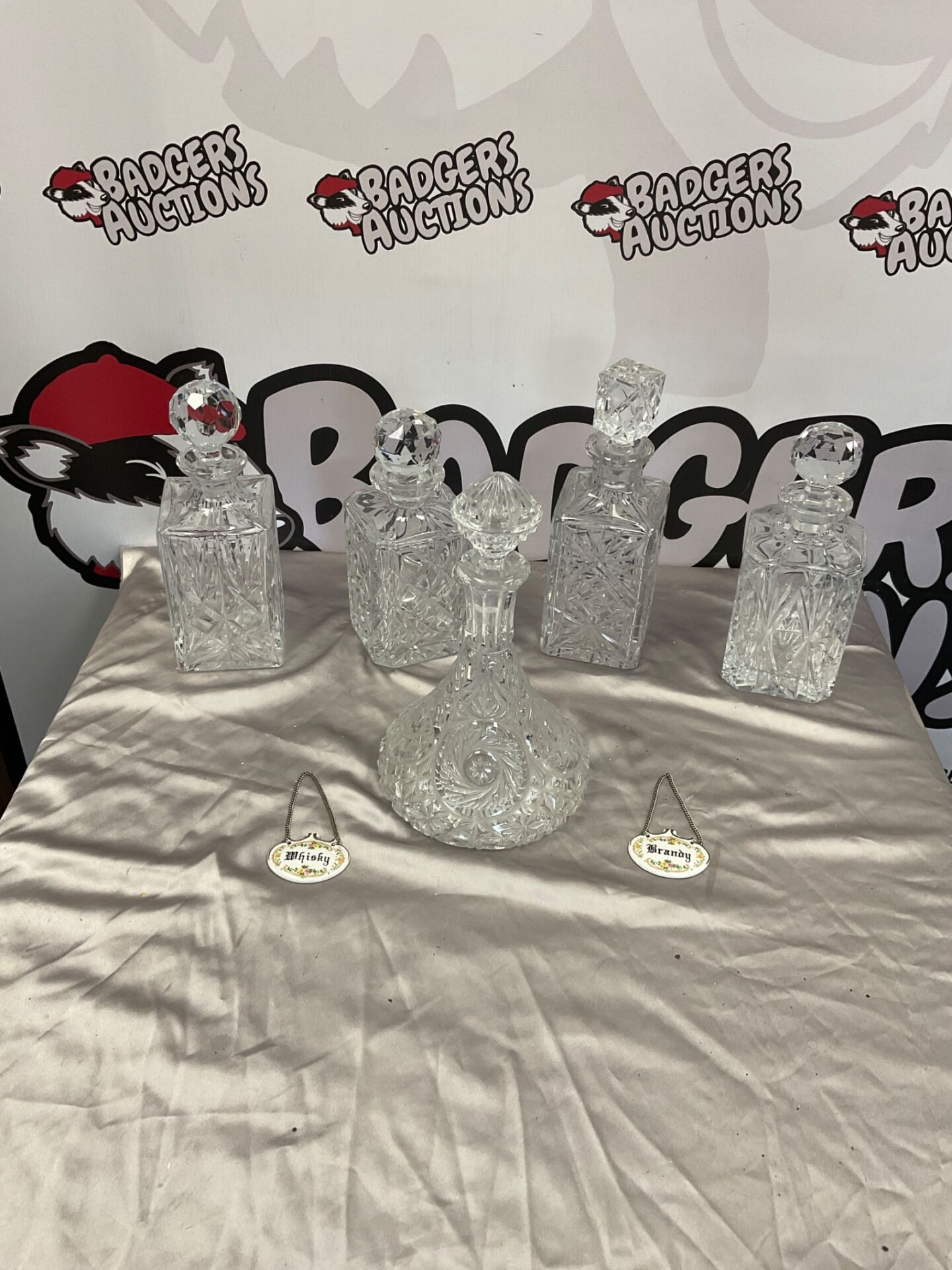 357 Selection of crystal Decanters with whiskey and Brandy collar plates