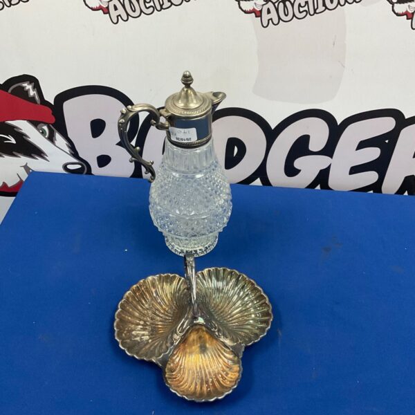 Cut glass wine jug with silverplate lid and three-shell silverplate dish