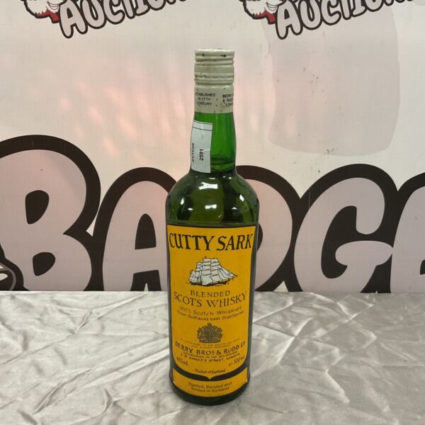 Sealed Cutty Sark Blended Scots Whisky 700ml bottle with yellow label and green glass