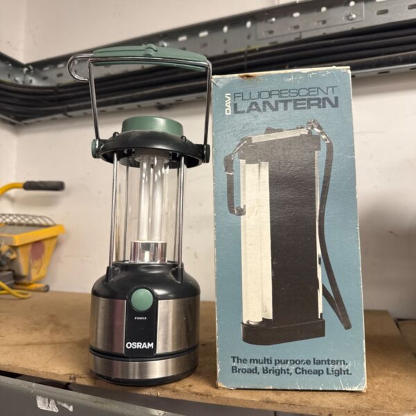 Vintage Davi camping lantern with blue and white casing.