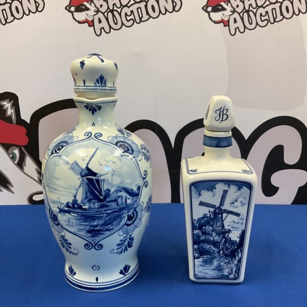 Vintage Delft Blue decanter with windmill scene.