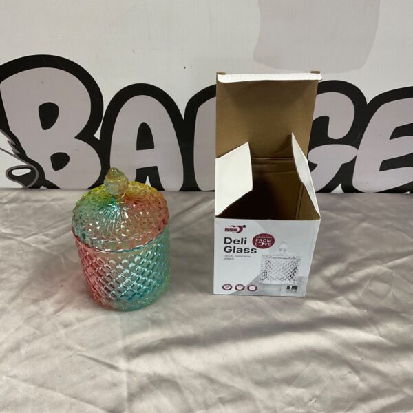 Rainbow iridescent Deli Glass crystal sugar bowl with faceted lid on grey fabric