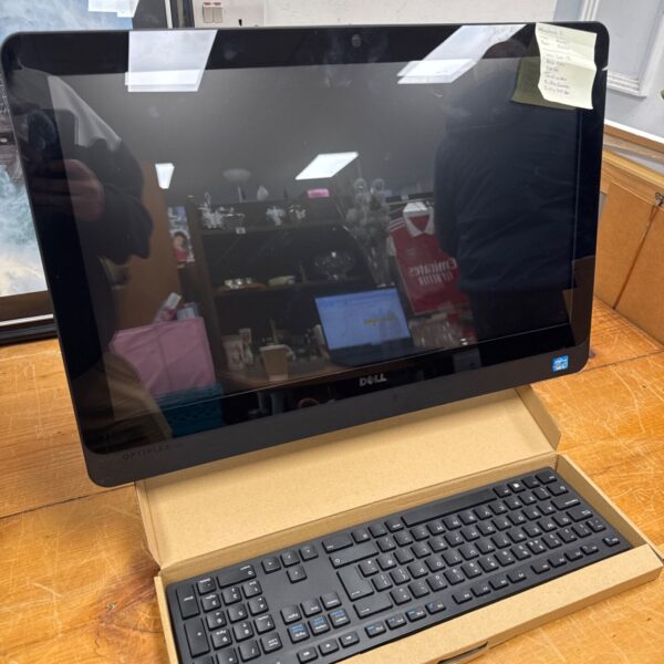 Dell Optiplex 9010 all in one PC with touchscreen display and keyboard.