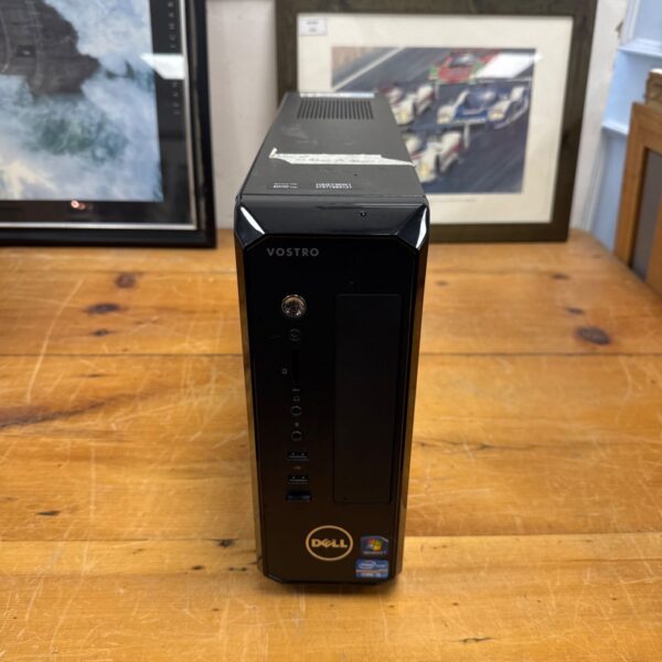 Dell Vostro desktop PC with black casing and power button.