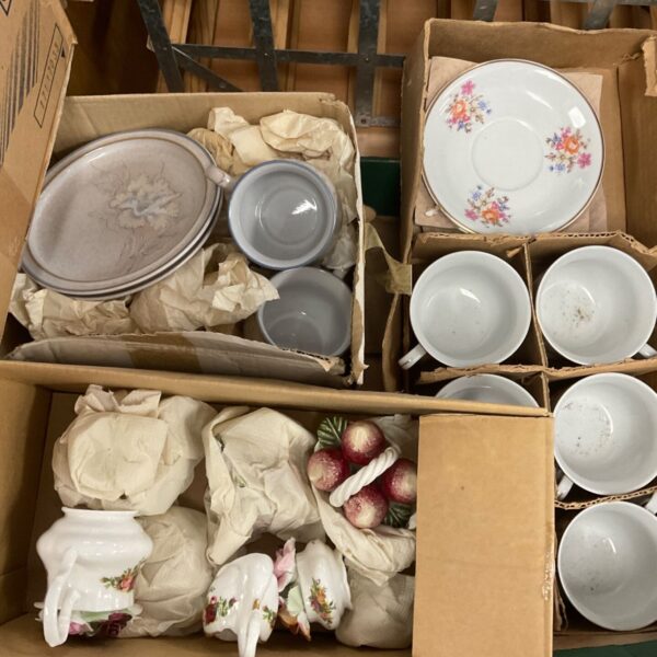 Boxed Denby stoneware and porcelain tea set pieces with floral saucers and cups