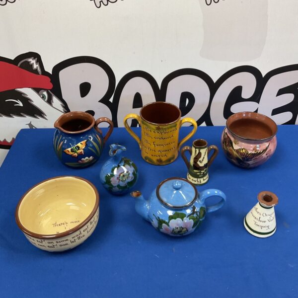 Antique Devonshire motto ware collection featuring colourful Victorian ceramics.