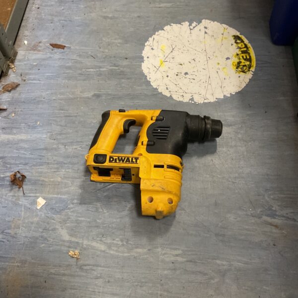DeWalt DC223 24v cordless SDS hammer drill, close-up view.