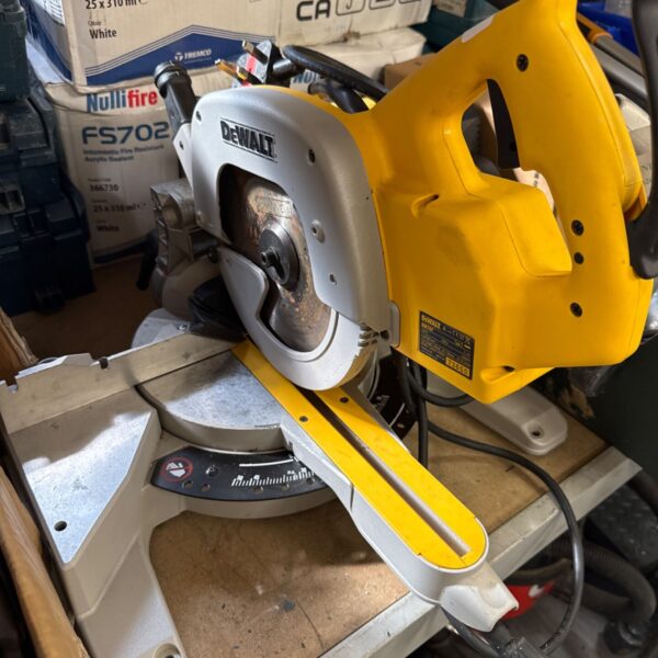 Dewalt DW707 chop saw in used condition, ideal for woodworking.