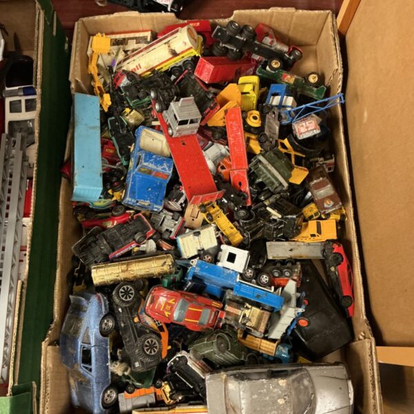 Large lot of vintage and modern diecast cars for collectors.