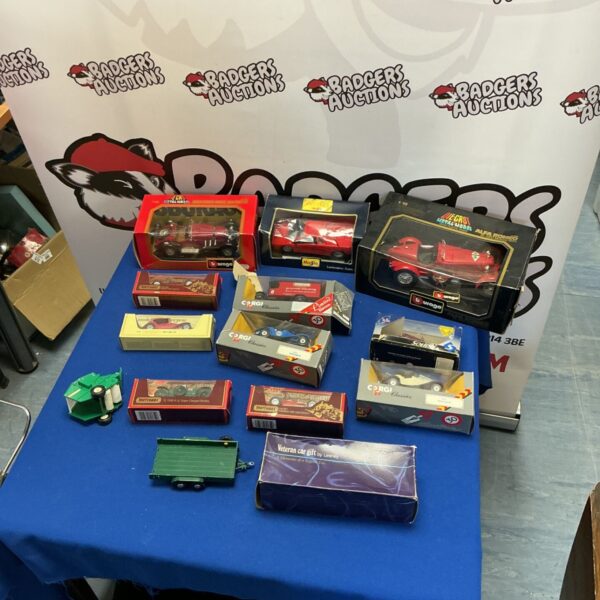 Diecast model car collection including Burago, Maisto, and Corgi Classics.