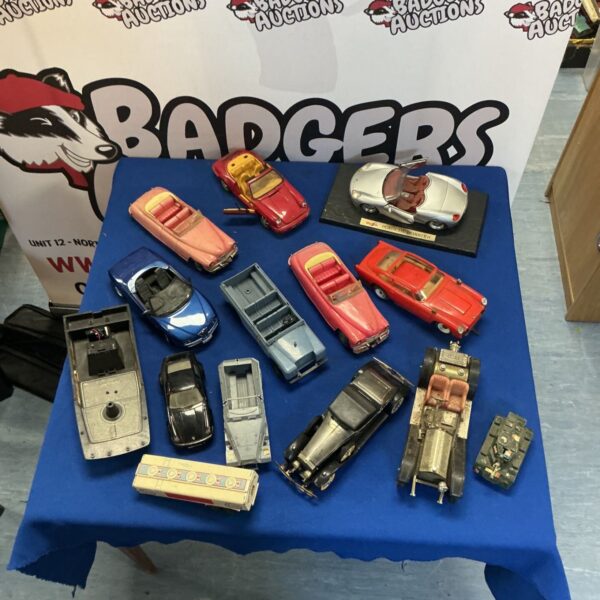 Lot of diecast model cars including Maisto and Anson brands.