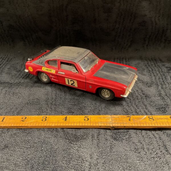 Red Dinky Toys 3 litre Ford Capri diecast model, front three-quarter view