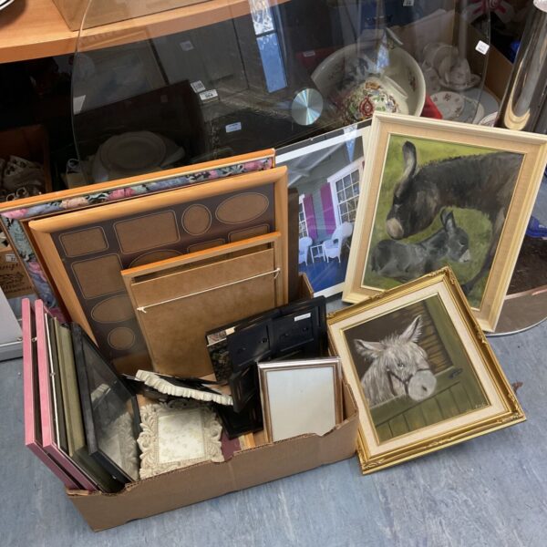 Box of picture frames with two framed oil paintings of donkeys