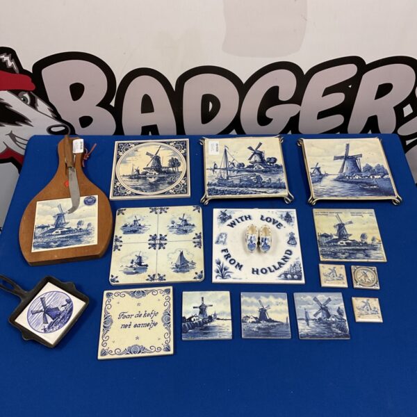 Collection of Dutch Delft blue ceramic tiles with windmill and canal scenes
