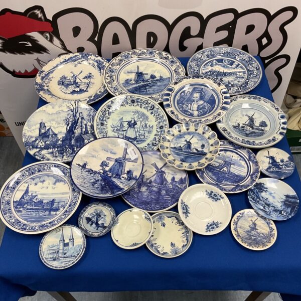 Collection of Dutch Delft blue and white plates with windmill and canal designs