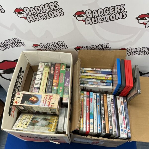 Assorted DVD and VHS tape lot for collectors and movie fans.
