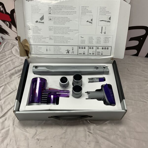 Dyson car cleaning kit accessories displayed in open original box