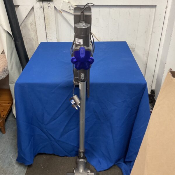 Dyson DC35 cordless stick vacuum cleaner in blue and grey with floor head
