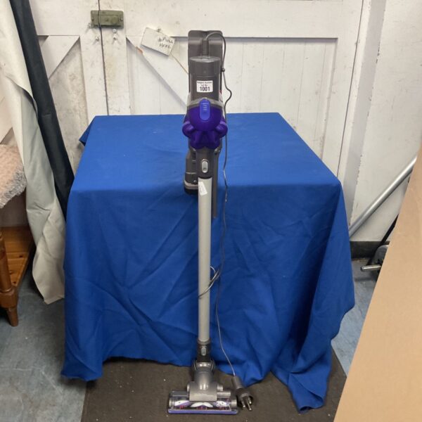 Purple and grey Dyson DC35 cordless stick vacuum cleaner with motorised floor head