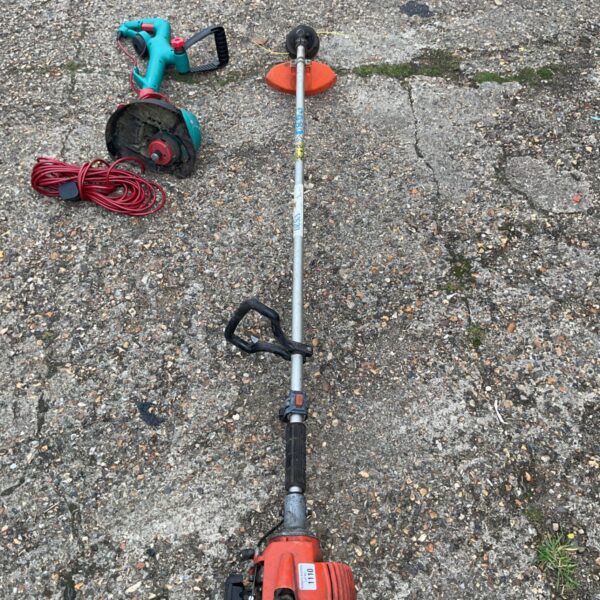 Used Echo petrol grass strimmer for garden and landscaping work.