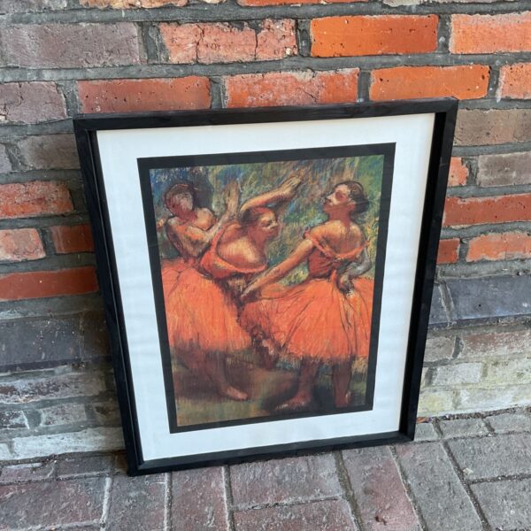 Framed Edgar Degas print of dancers in red skirts, vintage ballet art.