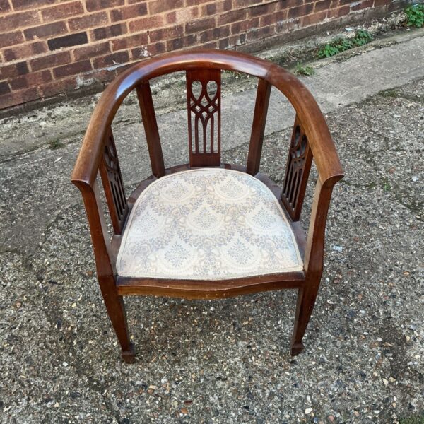 Edwardian inlaid tub chair with patterned upholstery and dark wood frame.