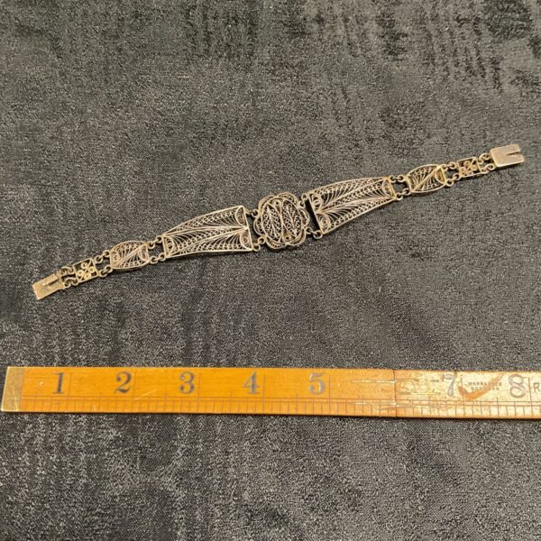 Vintage Egyptian silver filigree bracelet with central medallion and openwork panels