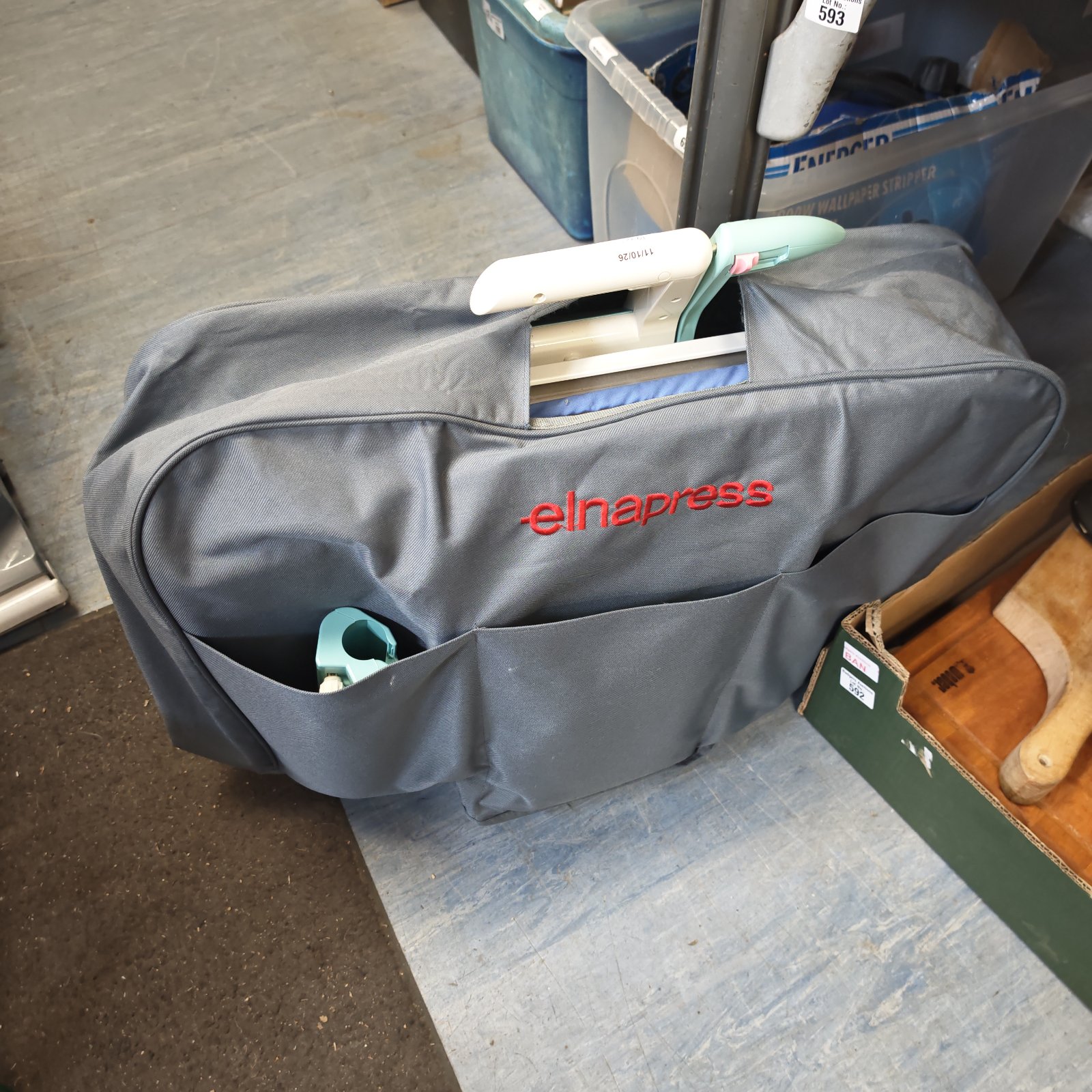 Vintage Elnapress electric iron in its original carrying case.