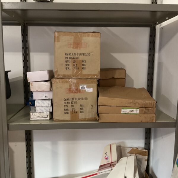 Job lot of Enlite E6 Pro LED downlights in cartons on metal shelving