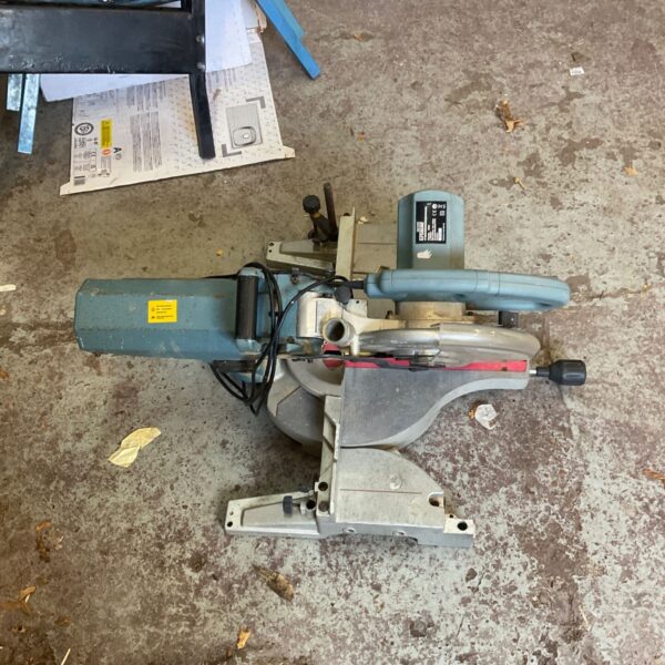 Erbauer sliding compound mitre saw with teal motor housing and grey base