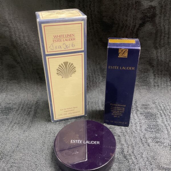 Estee Lauder beauty lot featuring White Linen perfume and other cosmetics.