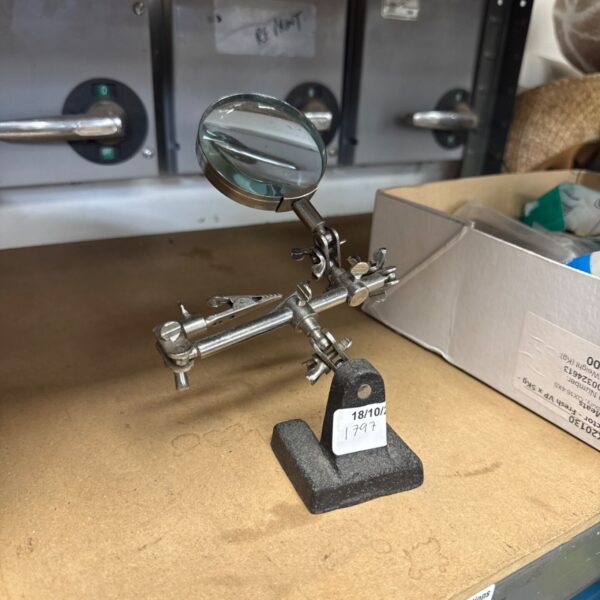 Vintage EXEL 20A magnifying clamp for detailed work.