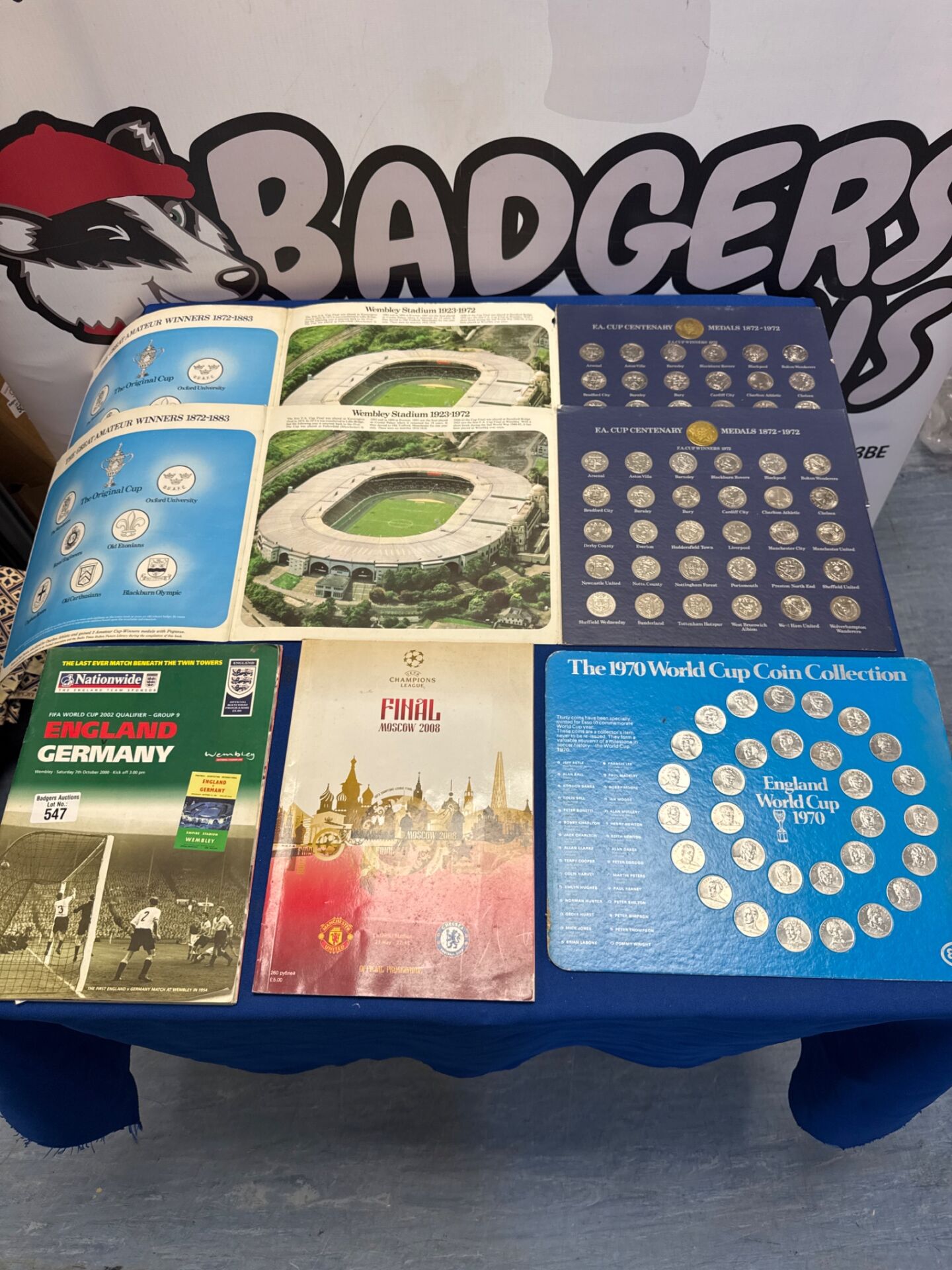 547 Two complete FA cup centenary, complete World Cup 1970 coin collections with man united Moscow 2008 champions league final programme & England vs Germany 2002 WC qualifier program