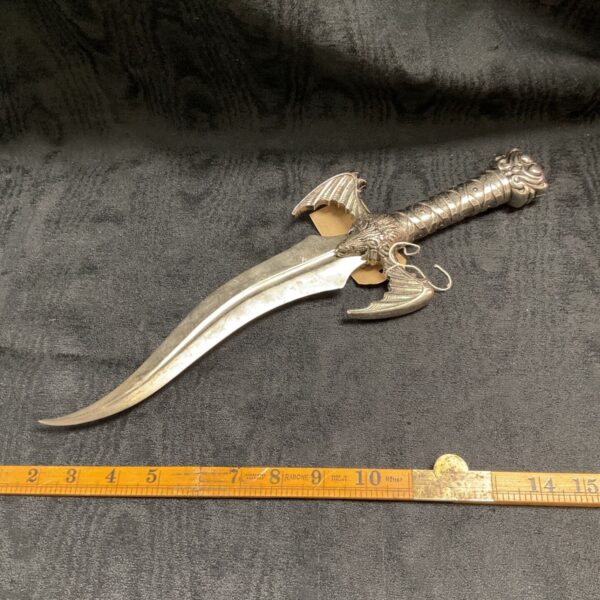 Silver fantasy dagger with angel wings, a unique collectible item.