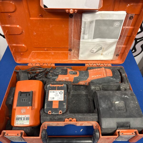 Open Fein oscillating multi tool kit with batteries and charger inside.