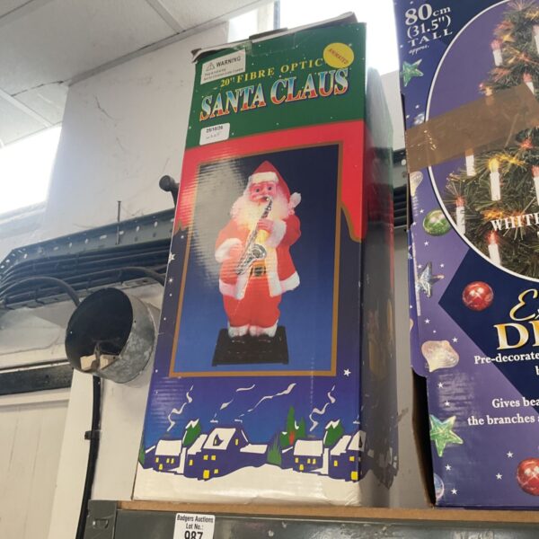 Boxed 20" fibre optic Santa Claus Christmas decoration with saxophone-playing figure