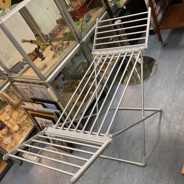 Fine Elements electric clothes drier, a folding laundry drying rack.