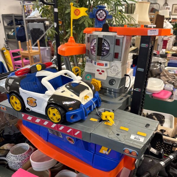 Fisher Price police play centre with included toy car.