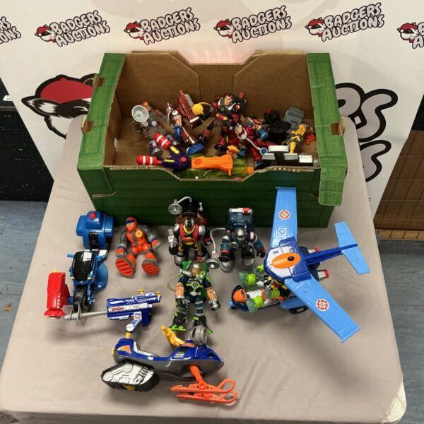 Fisher Price Rescue Heroes figures and vehicles in a toy lot.