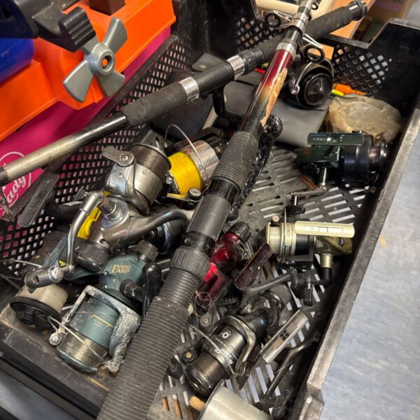 Mixed lot of fishing reels and rods for sale.