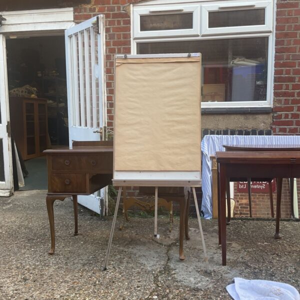 Vintage wooden flip chart easel for presentations and drawing.