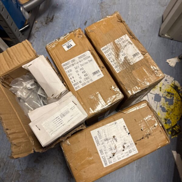 Sealed boxes of flush bolts and door stop springs hardware.