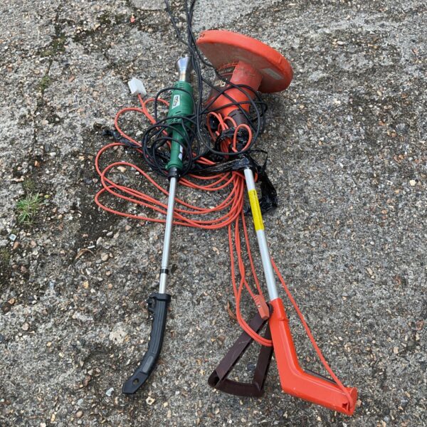 Used Flymo strimmer and Victor weed burner for garden maintenance.