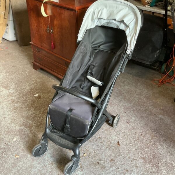 Black and grey folding push chair with canopy hood and padded seat