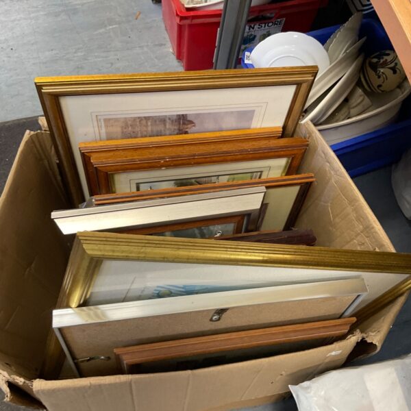 Mixed lot of framed artwork and vintage prints for wall decor.