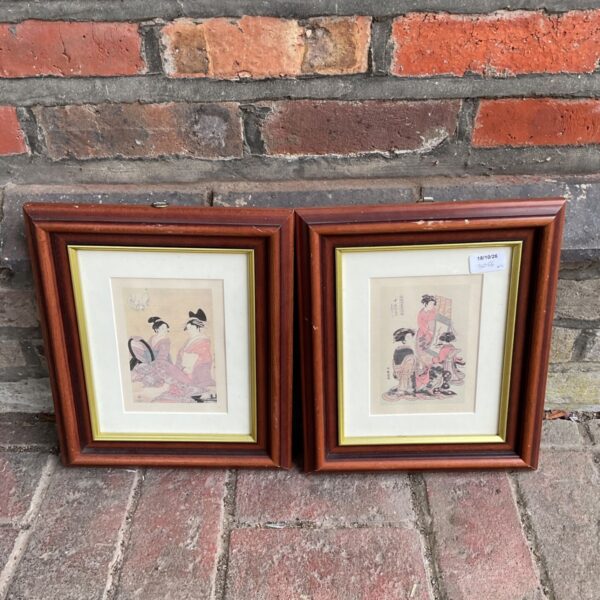Framed Japanese print of a geisha girl, vintage wall art.